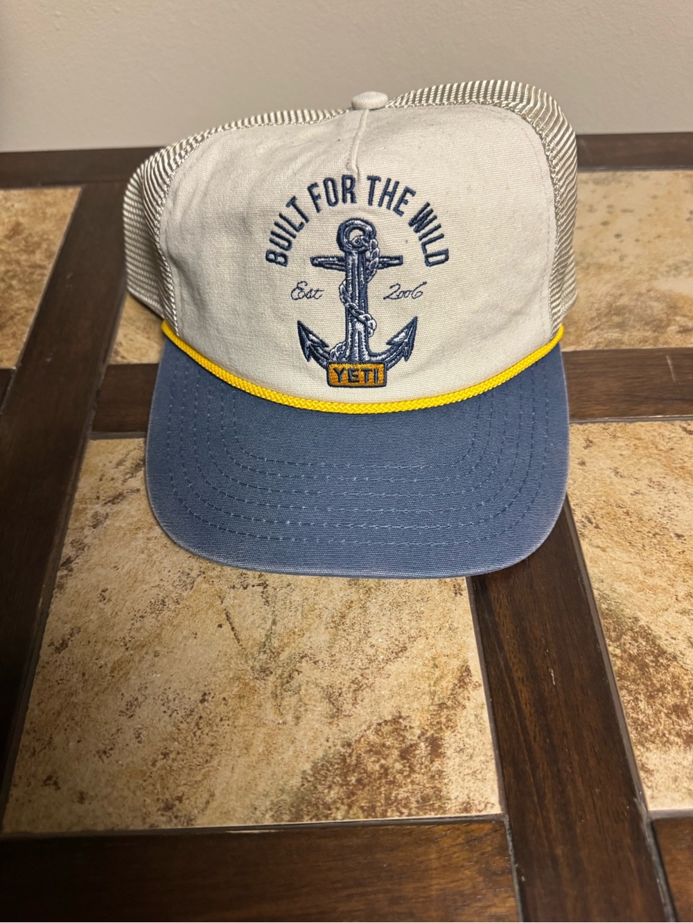 Yeti Cream & Blue Anchor Trucker Hat with Yellow Trim